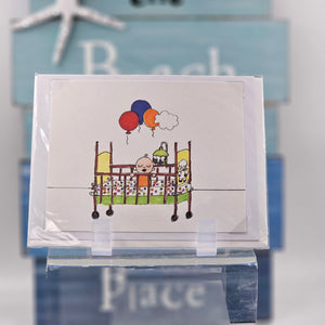 Baby in a Crib Card