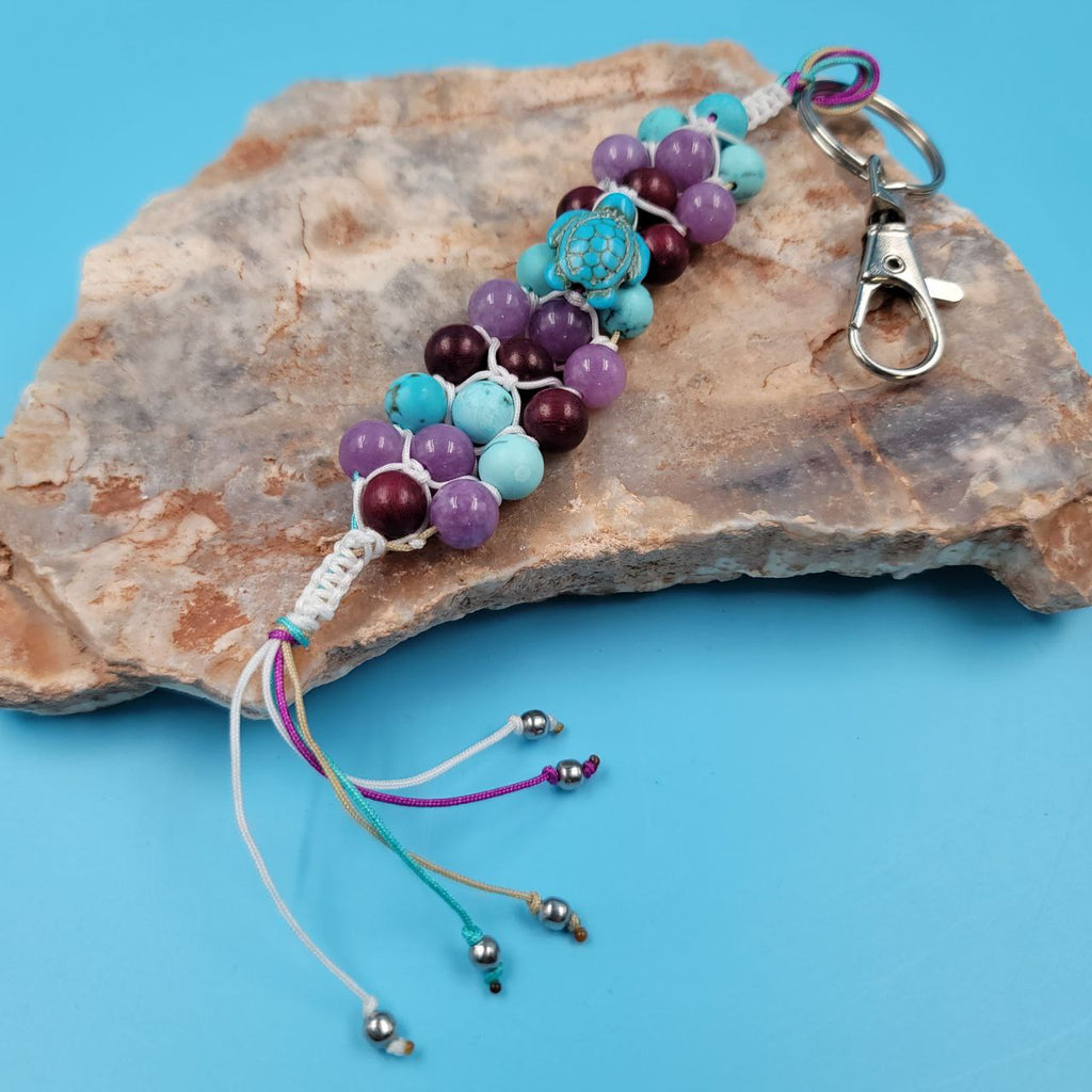 K31 Pebble Beach Keychain 

3 Strand Woven Keychain